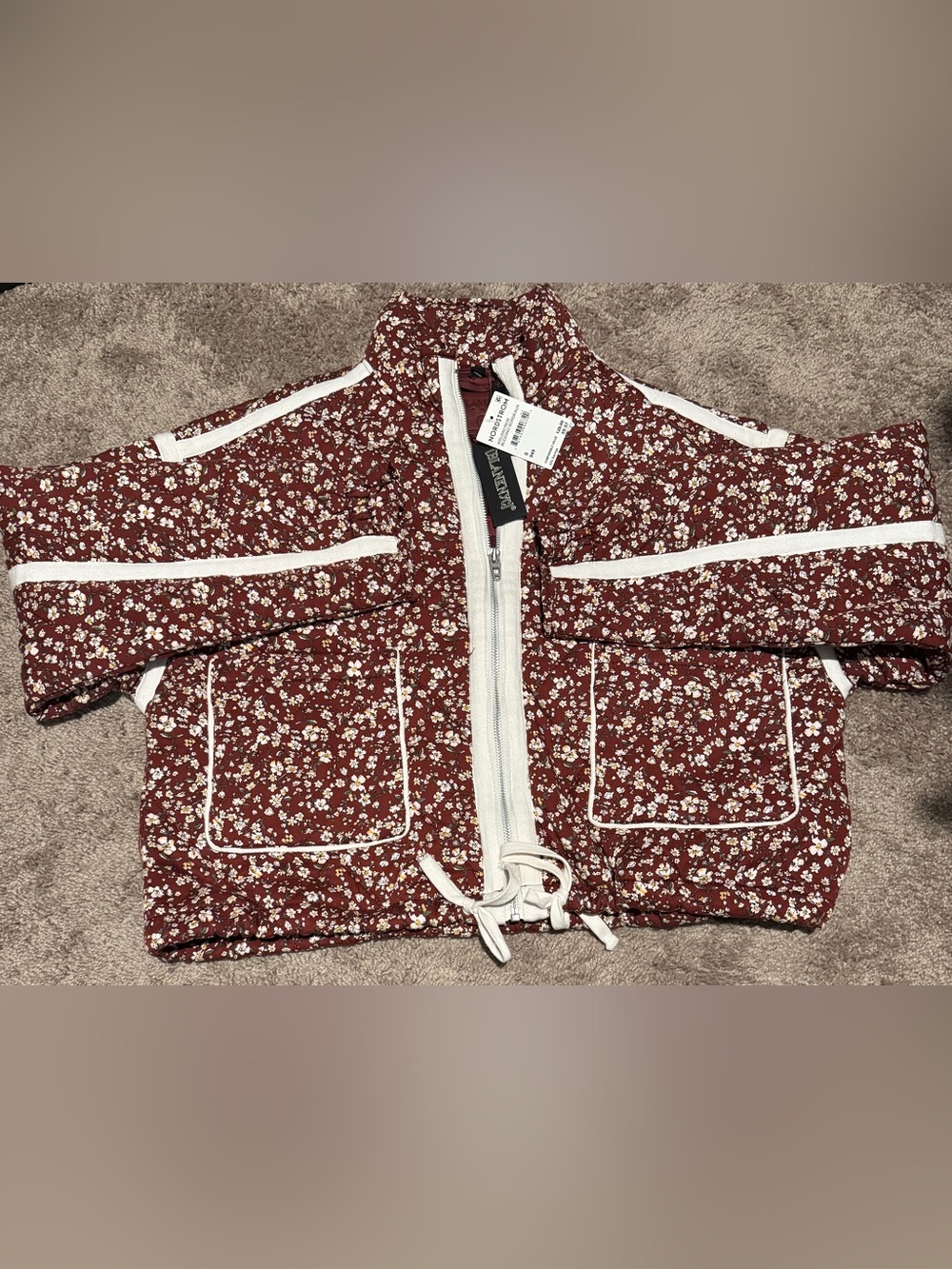 Blank NYC Floral bomber Jacket in Red, White, and pink  floral print
